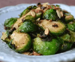Delicious roasted Brussels sprouts topped with golden brown butter and crunchy almonds for a nutritious side dish.