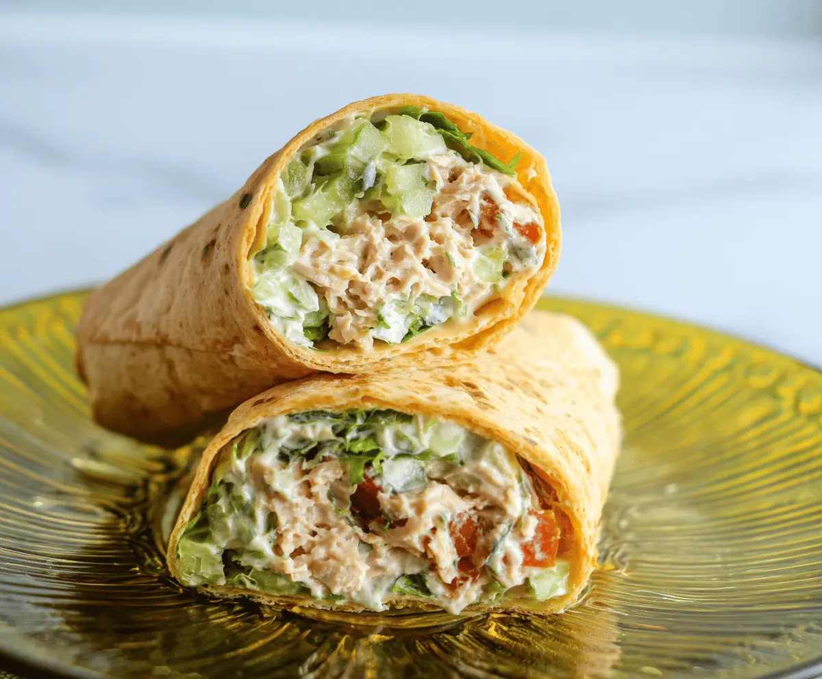 Delicious Tuna Cottage Cheese Wraps with fresh vegetables and herbs, perfect for a healthy snack or meal.