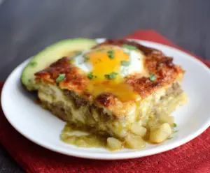 Delicious Breakfast Burrito Bake with crispy edges, melted cheese, and fresh ingredients ready to serve.