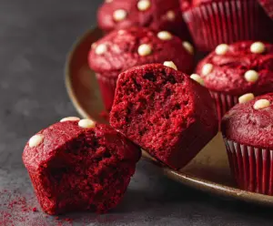 Delicious red velvet muffins with a soft and fluffy texture, perfect for dessert or snack time.