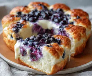 Delicious cottage cheese blueberry cloud bread topped with fresh blueberries and a light, fluffy texture.