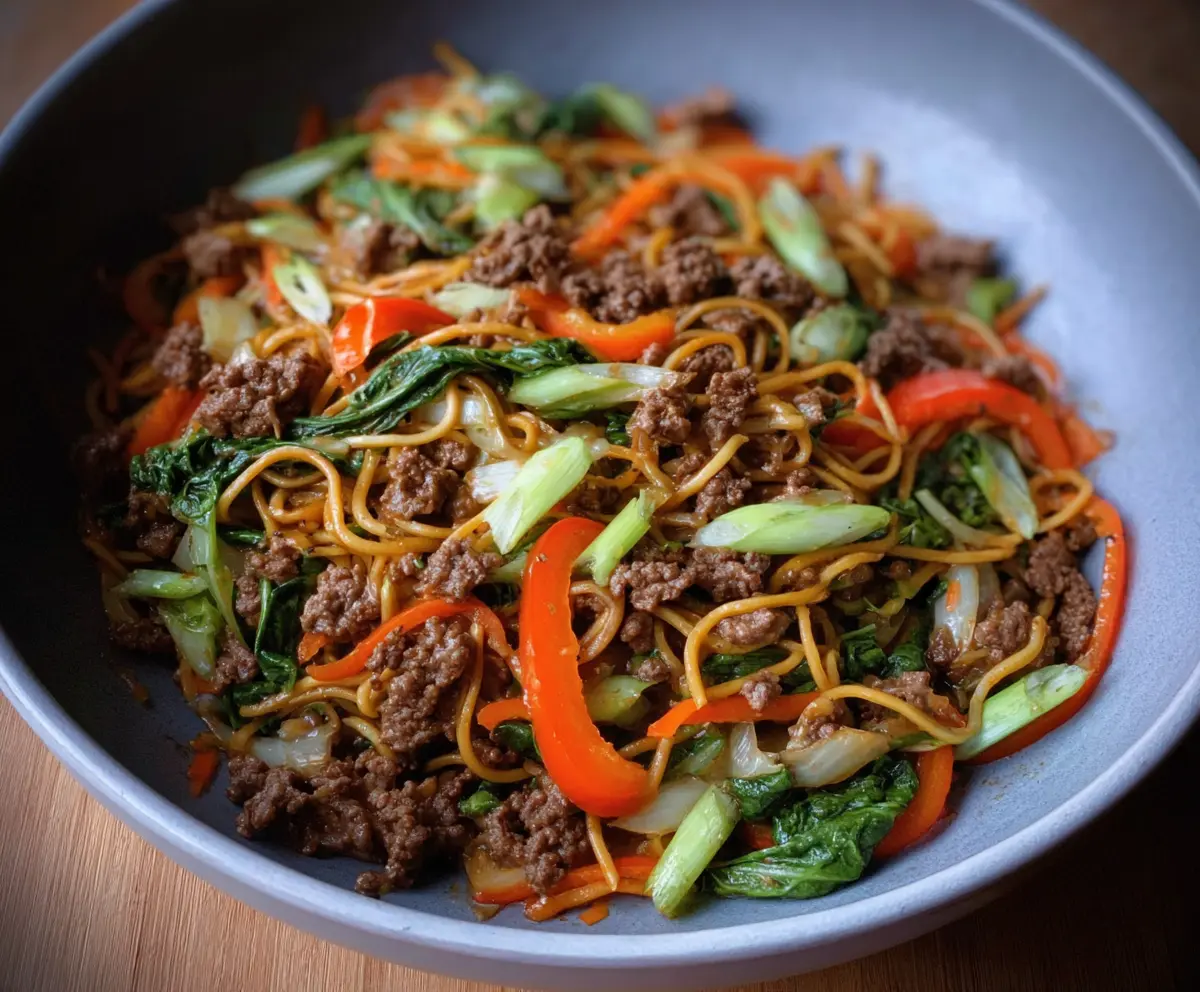 Delicious Ground Beef Chow Mein prepared in accordance with Whole30 guidelines, showcasing healthy stir-fried noodles and fresh vegetables.