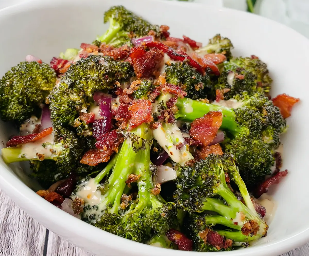 Delicious roasted broccoli bacon crunch salad with fresh greens and crispy bacon bits